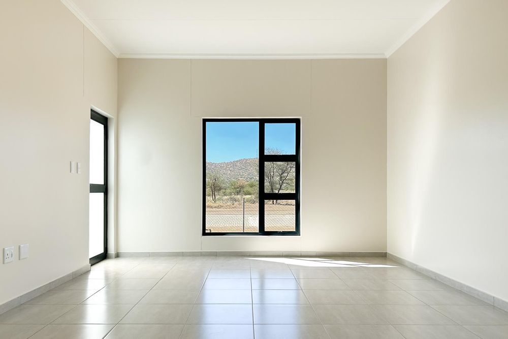 Modern, open-plan living area.