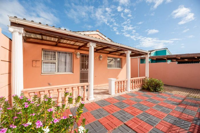 House for Sale in Mitchells Plain Central: 3 bedrooms, secure parking, spacious living areas.