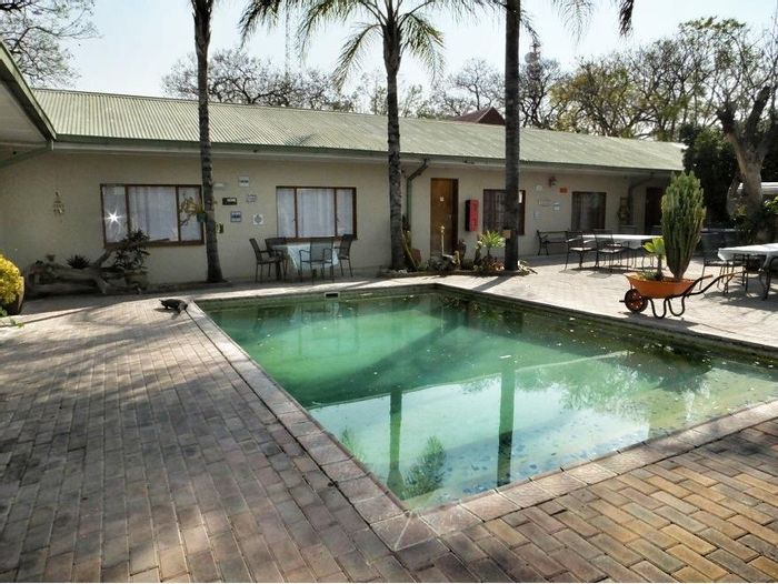 Guest House For Sale in Grootfontein Central: 8 rooms, pool, bar, and BBQ area.