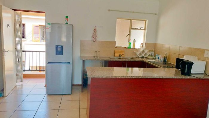 Akasia Central Apartment For Sale: 2 Bedrooms, secure parking, near amenities.