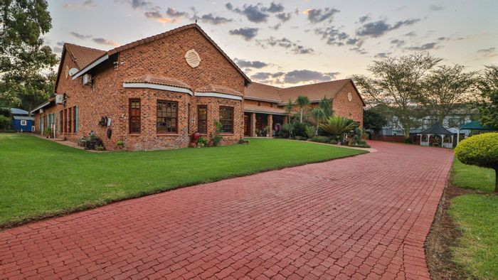 Charming Ruimsig Home with French Farm Kitchen, Pool, and Tranquil Gardens - For Sale