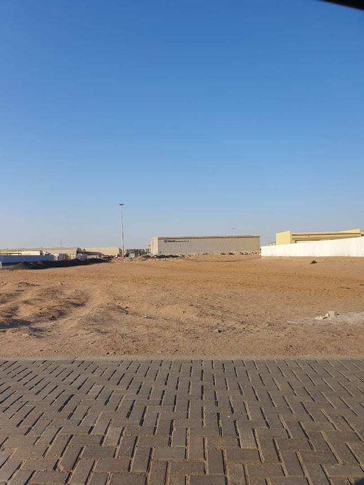 Prime Industrial Plot near Weighbridge: 21,072m2 with 1 boundary wall for Sale.