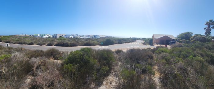 Vacant Land Residential in Grotto Bay Central For Sale with sea views and amenities.