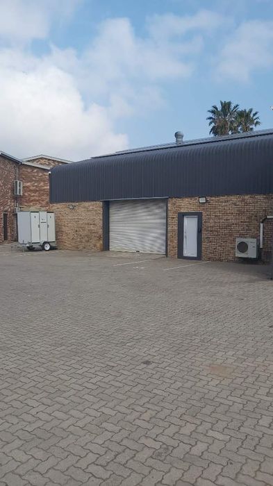 Industrial Warehouse To Rent in Newton Park with office, secure parking, and fibre.