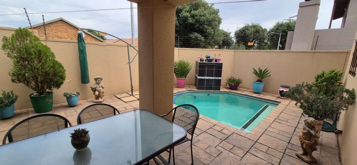 For Sale: Townhouse in New Redruth with 3 bedrooms, garden, and entertainment patio.