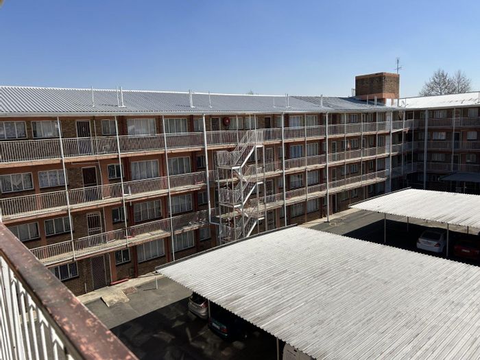 For Sale: Apartment in Benoni Central, 2 beds, secure building, close to amenities.