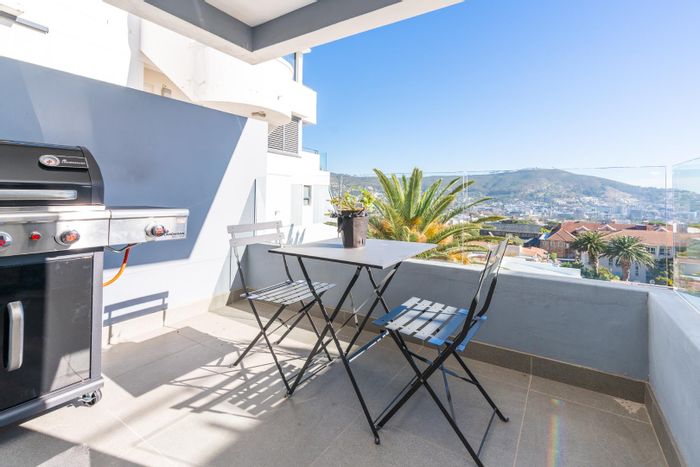 Vredehoek Apartment To Rent: 2 Bedrooms, Scenic Views, Secure Parking, Convenient Location.