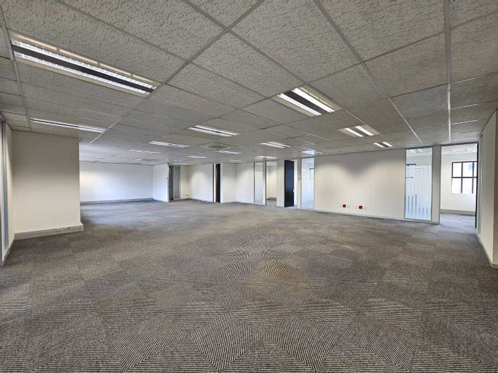 Bryanston Office To Rent: 631sqm, private kitchen, 24-hour security, parking options.