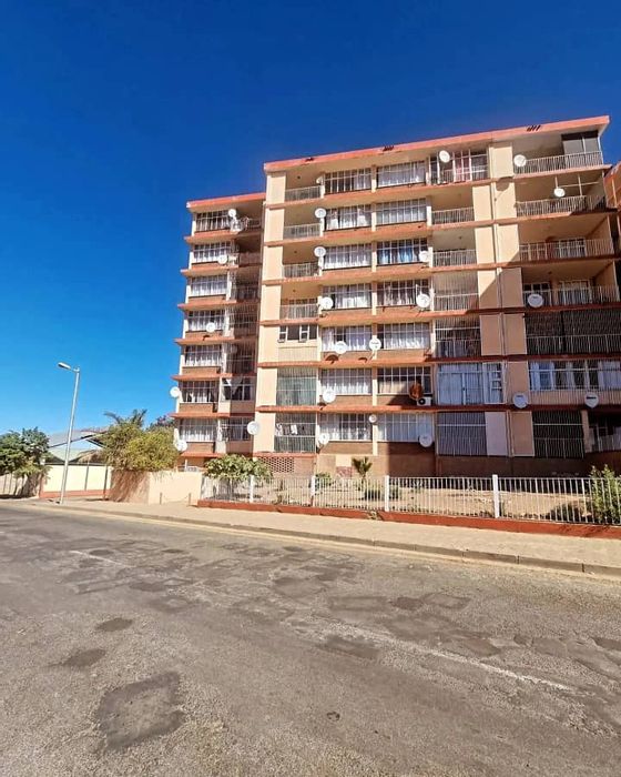 Prime Windhoek Central Apartment for Sale: One Bedroom, Secure Parking, Walk to Amenities!