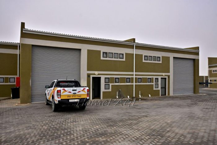 For Sale: Connected Warehouses in Secure Desert Industrial Park with Office Spaces