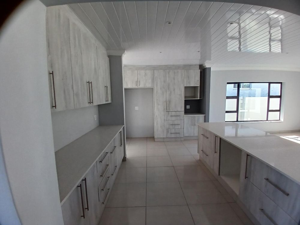 Focusing on the Kitchen - as from the 2nd Living Area.