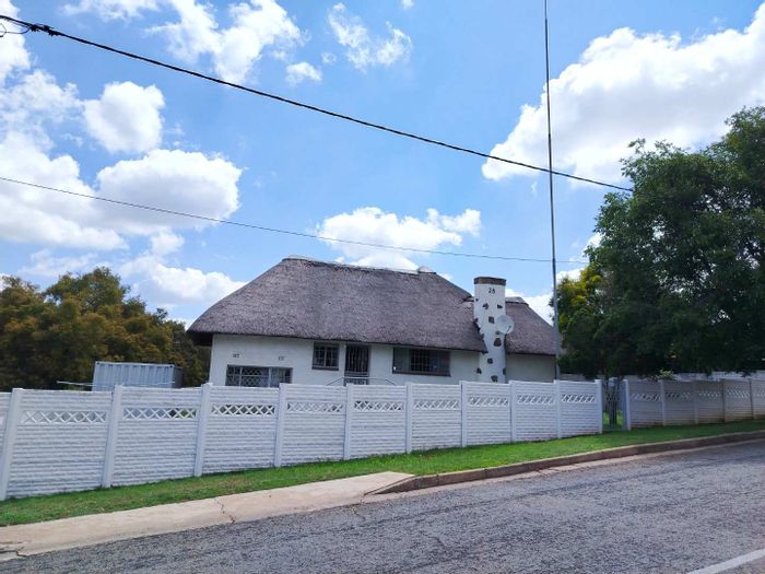 For Sale: Unique 3-Bedroom House in South Crest with Garages and Potential!