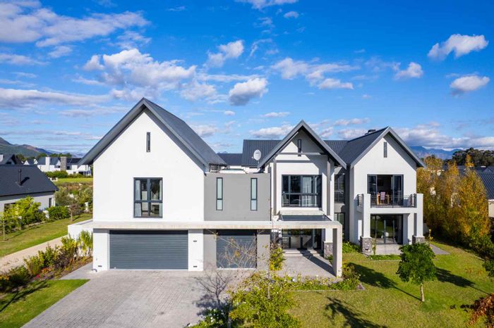 For Sale: House in Val De Vie Estate with lake views, pool, and garages.