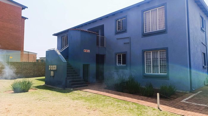 Terenure Townhouse For Sale: Two bedrooms, open-plan living, private balcony, secure complex.