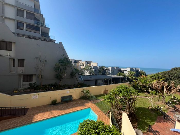 For Sale: Apartment in Umhlanga Central with beach access, pool, and income potential.