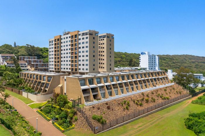 For Sale: Townhouse in Umhlanga Central with beach access, pool, and squash court.