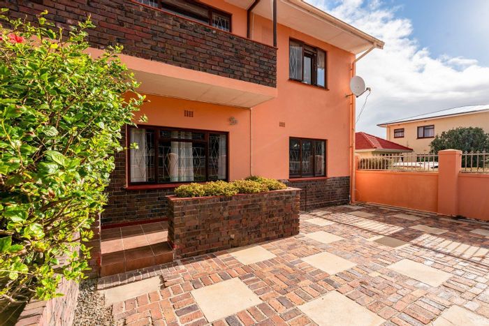 Bright Ground Floor Apartment in Fish Hoek Central with Private Garden and Security.