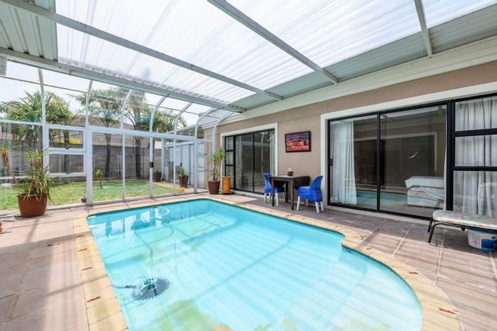 For Sale: Family house in Summerstrand with pool, security, and spacious living areas.