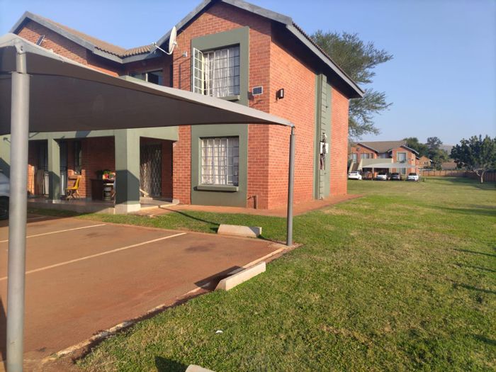 For Sale: Apartment in Theresapark with 2 bedrooms, covered parking, near amenities.