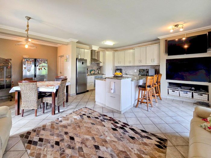 Dolphin Beach Townhouse For Sale: 3 beds, private balconies, garden, double garage.