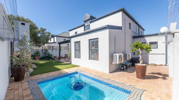 For Sale: House in Atlantic Beach Golf Estate with solar power, splash pool, and ample parking.