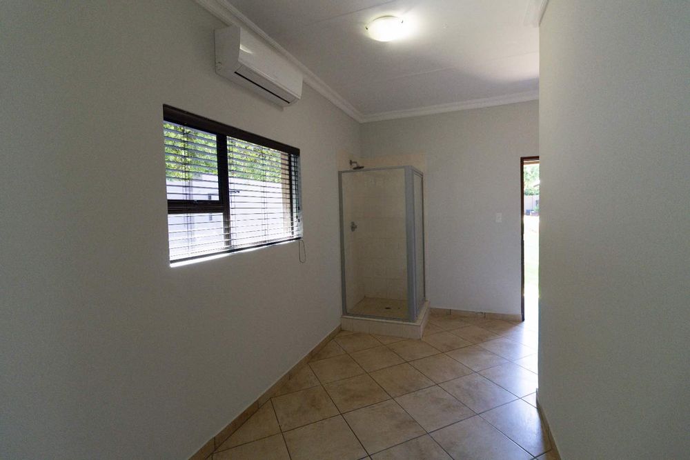 Domestic worker room with shower and separate toilet