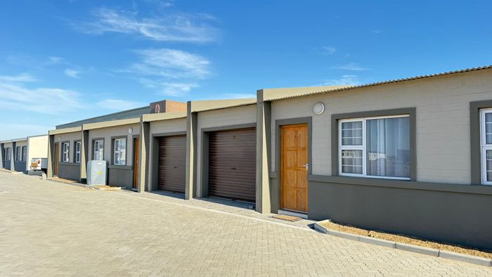Townhouse For Sale in Walvis Bay Central: 2 Bedrooms, Secure Complex, Private Courtyard.