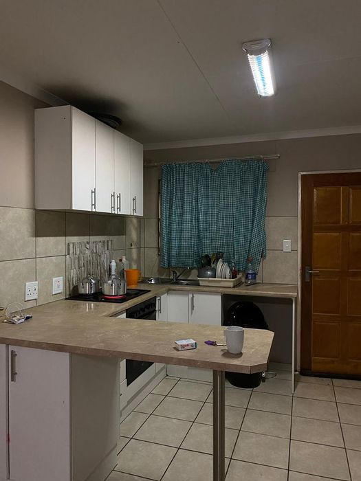 For Sale: Otjomuise Apartment with 2 Bedrooms, Built-in Stove, and Cupboards.