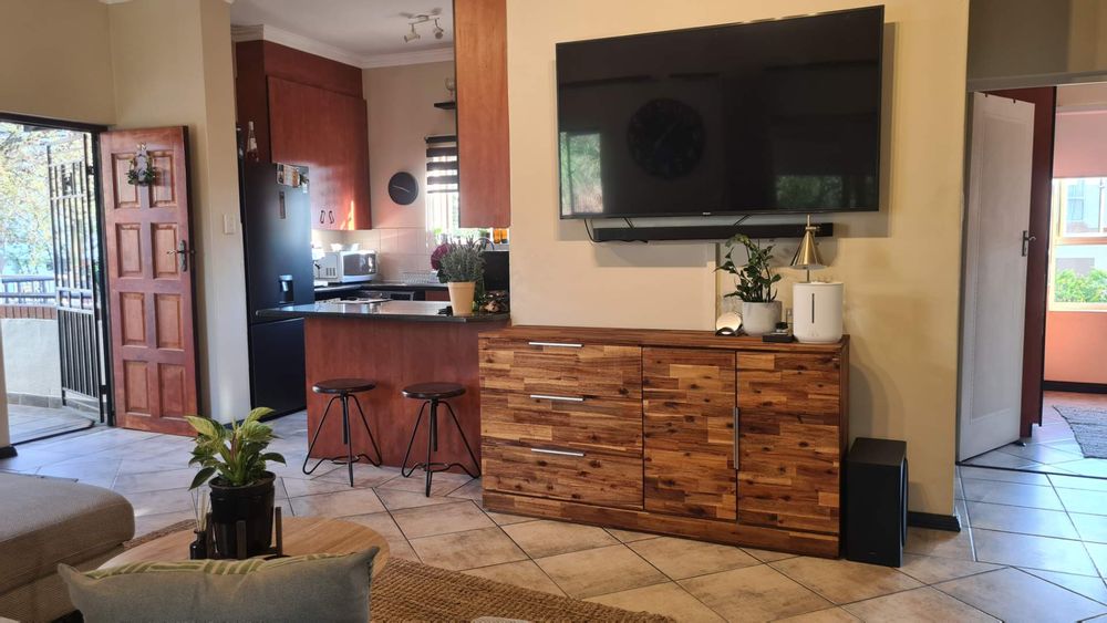 Kitchen with breakfast nook open plan to living area