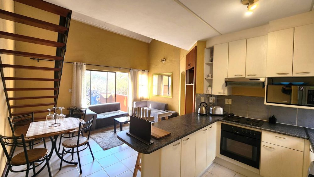 View through the open plan kitchen from the front door.