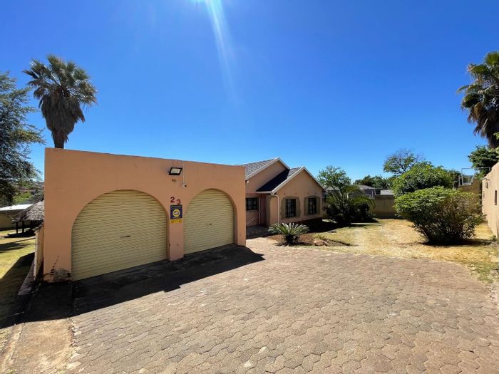 For Sale: Spacious 4-bedroom house in Alan Manor with garden and secure garage.