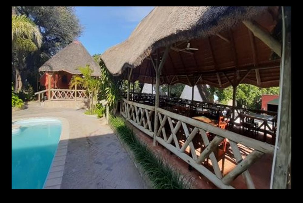 Outdoor dining area and pool