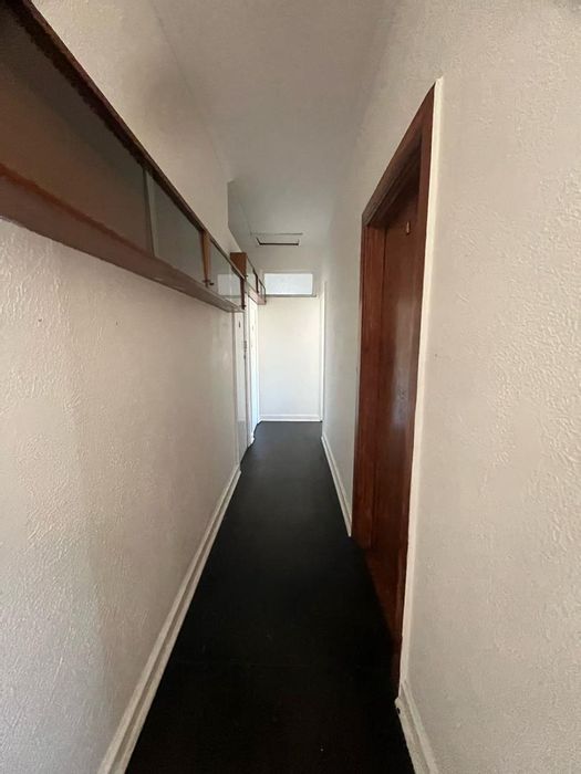 Apartment To Rent in Newton Park: Two rooms, shared kitchen and bathroom, open parking.