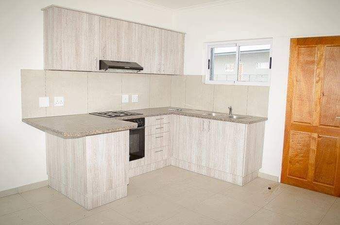 For Sale: Apartment in Rocky Crest with two bedrooms, garage, and open plan kitchen.
