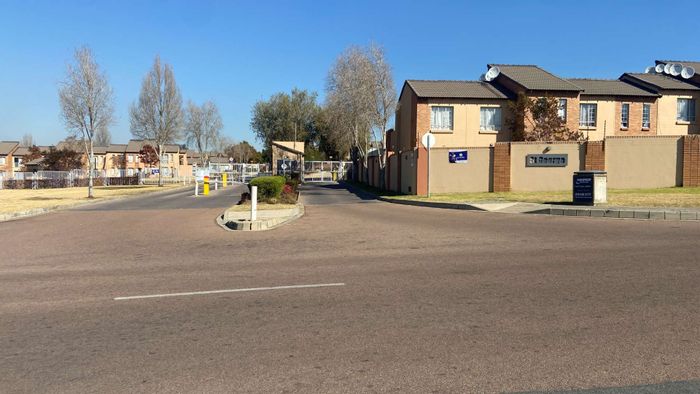 Erand Gardens Apartment For Sale: Ground floor, secure complex, garden access, carport.