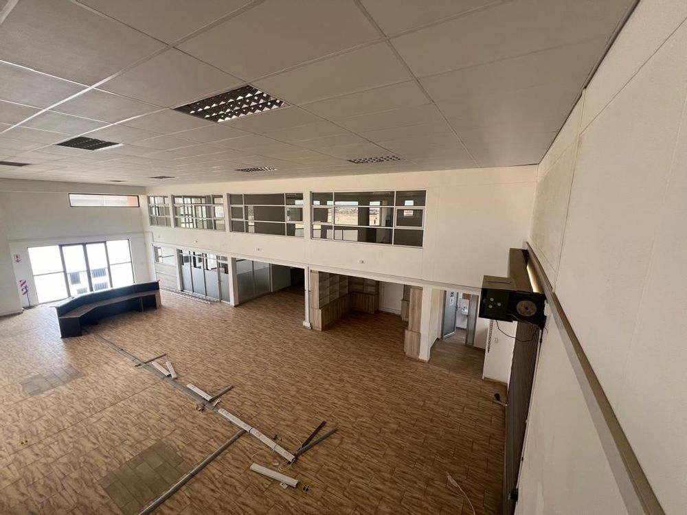 Upstairs: Main entrance reception area, offices and upstairs entertainment area