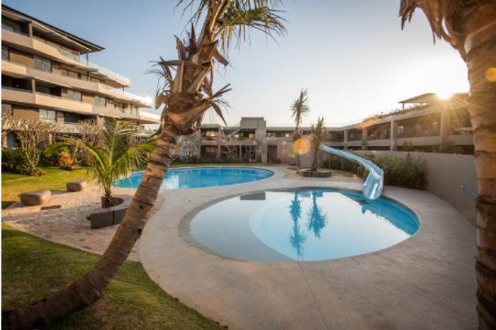 Sibaya Apartment To Rent: 2-bed, 2-bath, patio, pools, kids' area, security.