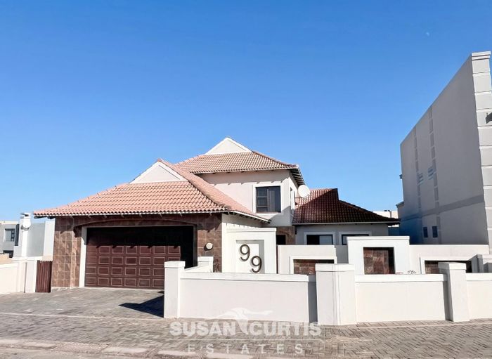 For Sale: 4-Bedroom House in Long Beach with spacious yard and double garage.