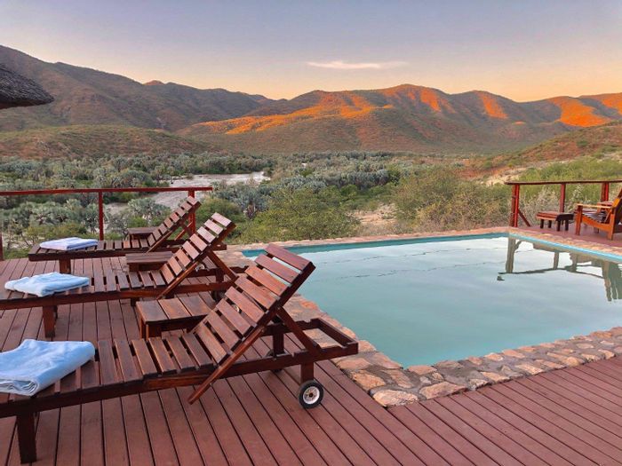 Lodge for sale in Epupa: 10 chalets, pool, restaurant, and solar power.