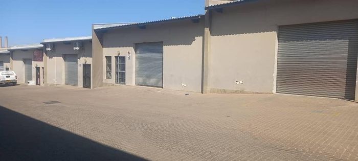 Industrial Warehouse for Sale in Lafrenz Industrial with office space and parking.