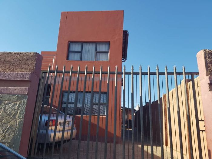 For Sale: 4-Bedroom House in Katutura with Extra Outside Bedrooms and Amenities.