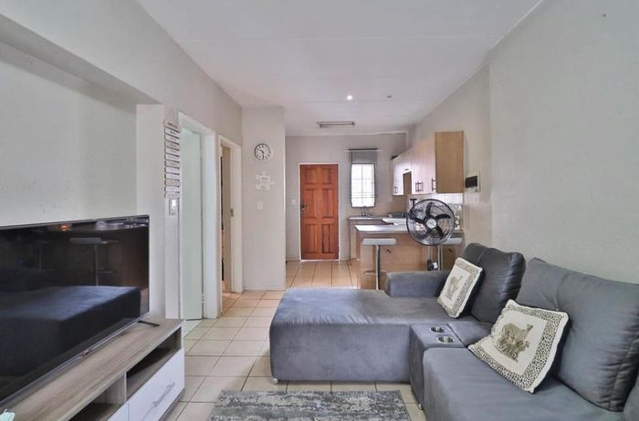 For Sale: Boksburg North Apartment with 2 beds, patio, secure parking, and amenities.