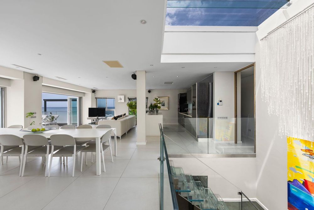 open plan dining room and sky light that opens and closes.