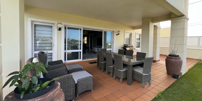 La Lucia Apartment For Sale: Spacious layout, pool, double garage, and scullery.