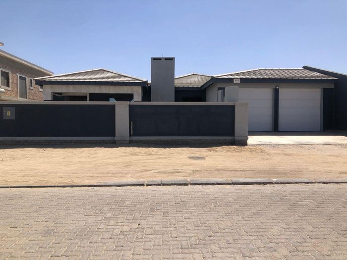 For Sale: House in Swakopmund Ext 3 with income-generating flats and garages.