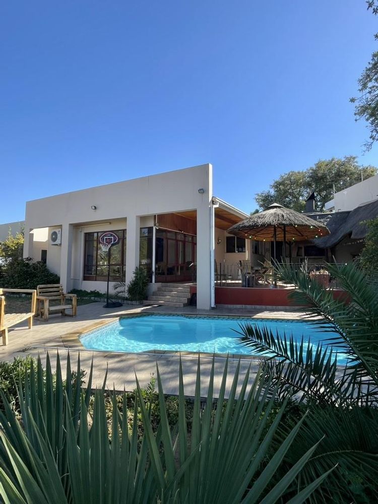 Pool with View of House