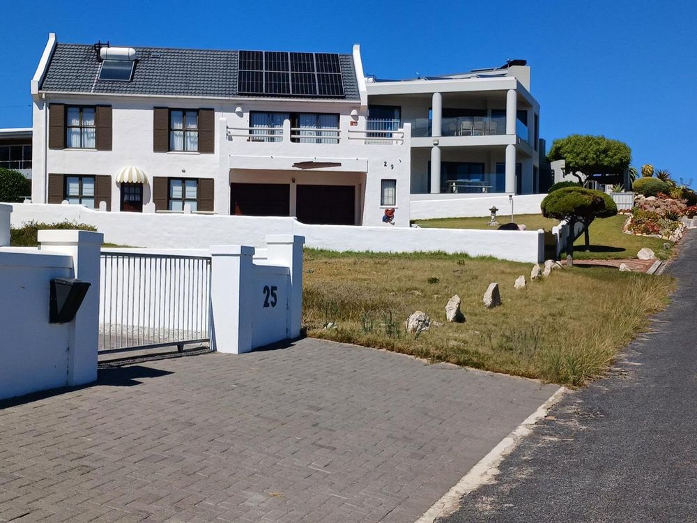 2 Upmarket Houses; our Plot is directly behind the 2nd House (next to the Street).