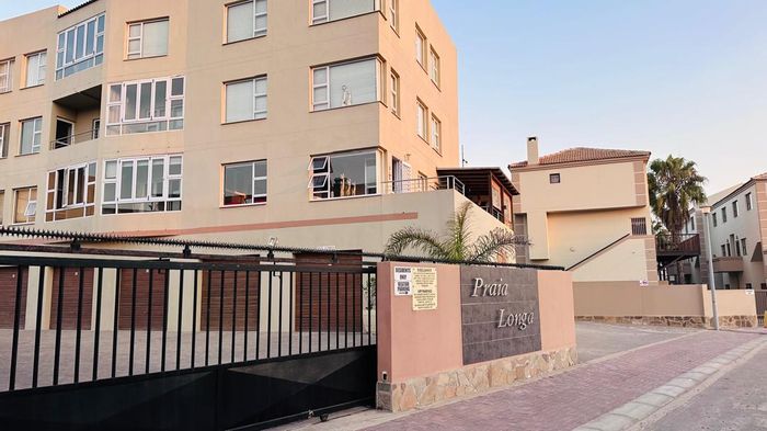 2-bedroom apartment for sale in Dolphin Beach with garage and beach access.