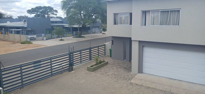 Townhouse For Sale in Okahandja Central: 3 beds, double garage, private backyard.