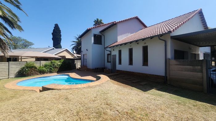 5-bedroom house in Brackendowns for sale with pool, braai area, and garages.